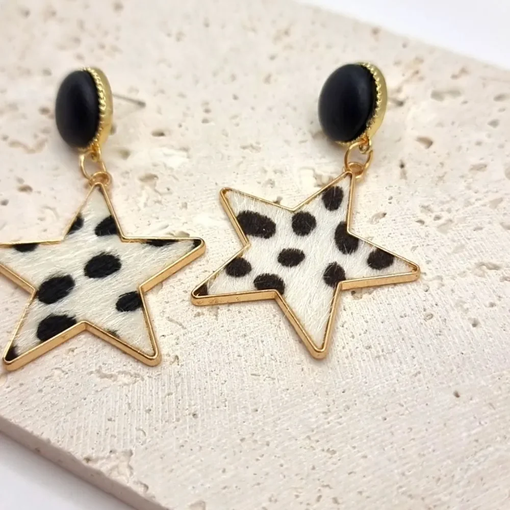 FREE PEOPLE City slickers faux cow hyde star earrings | NWOT
